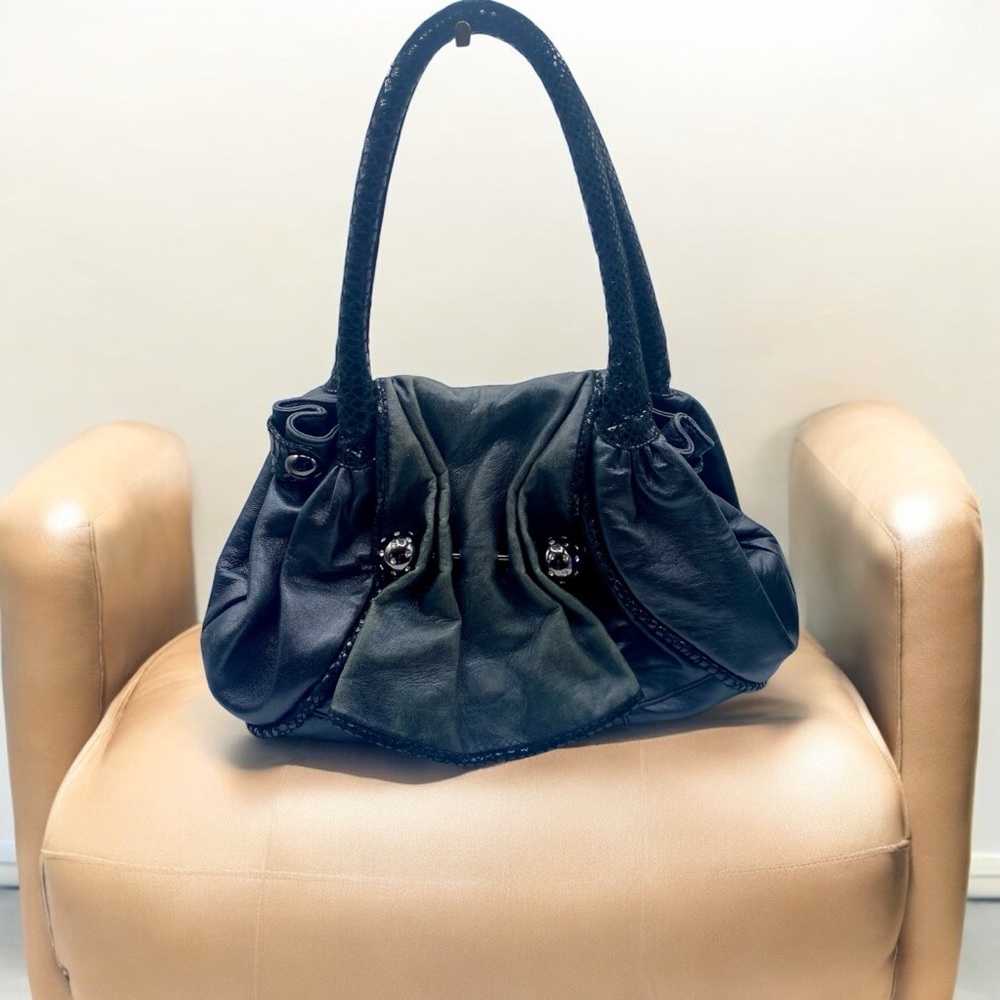Sleek Black Shoulder Bag with Glossy Finish and Spacious Interior